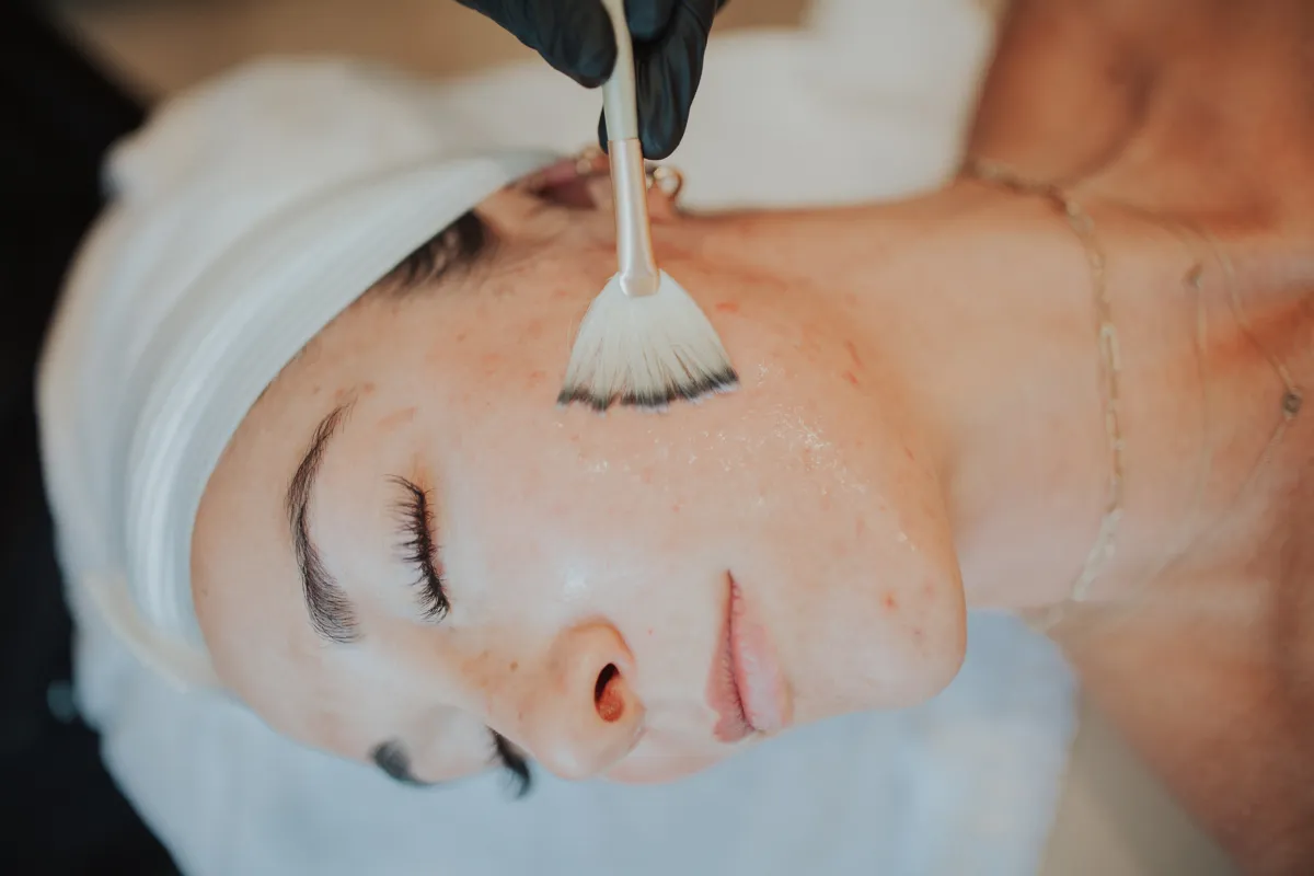Client receiving a facial treatment at Honey Rae Aesthetics